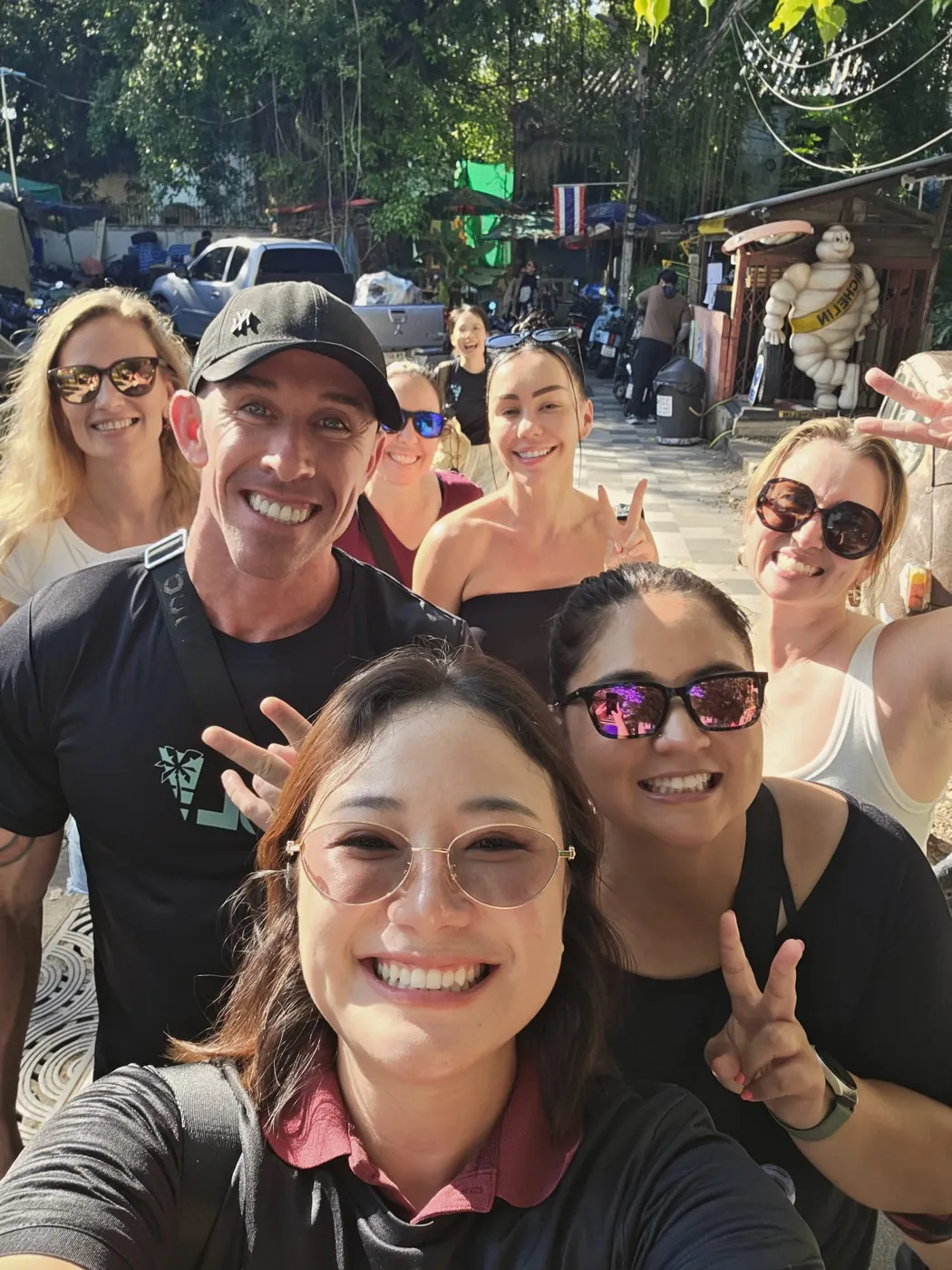 A group selfie on the streets of Bangkok